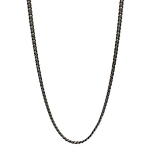 A product photo of a men's blackened silver chain on a blank white background. The chain has classic, 120 gauge ovoid-shaped curb links.