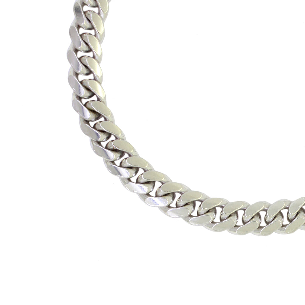 
            
                Load image into Gallery viewer, A product photo of a men&amp;#39;s silver wrist chain on a blank white background. The chain has classic, 120 gauge ovoid-shaped curb links.
            
        