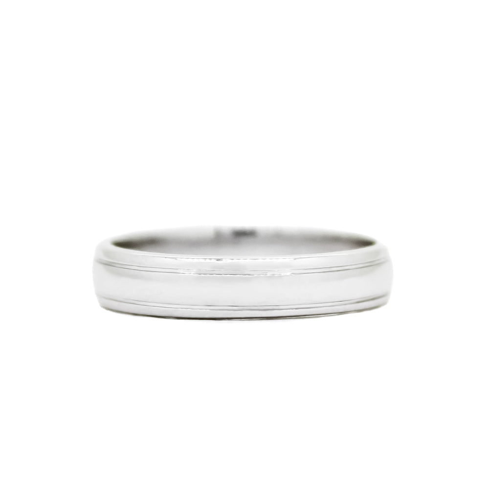 
            
                Load image into Gallery viewer, A product photo of a mens&amp;#39; ring made of 9k white gold. The band is 5mm tall and detailed with two polished grooves running along its length.
            
        