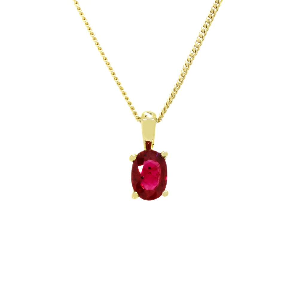 A product photo of a simple 0.54ct oval ruby pendant in 9k yellow gold suspended against a white background. The deep red magenta stone is included with unique inky swirls and black specks, and is held in place by 4 golden claws.