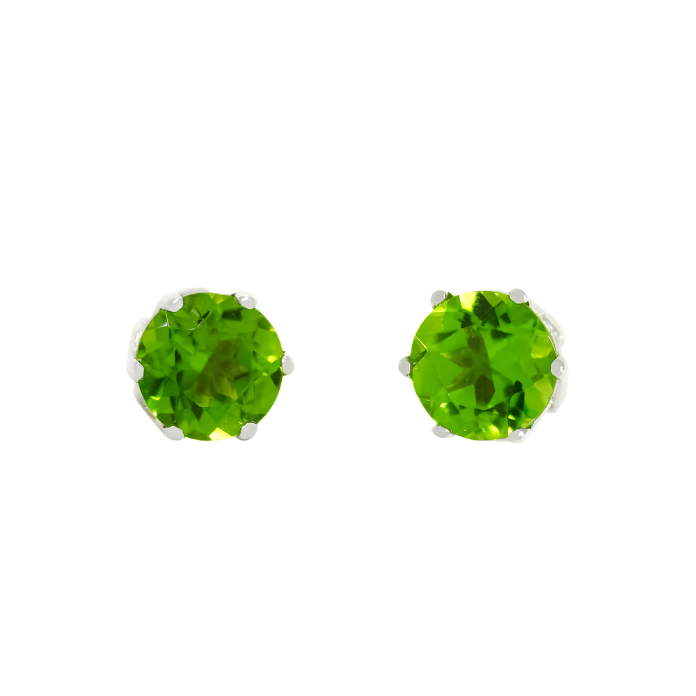 
            
                Load image into Gallery viewer, A product photo of 7mm Round Peridot Earring Studs in 9ct Yellow Gold sitting on a plain white background. The stones are held in place by 4 delicate golden claws arranged in a flower-like pattern where they meet the stud. The peridots reflect chartreuse hues across their multi-faceted edges.
            
        