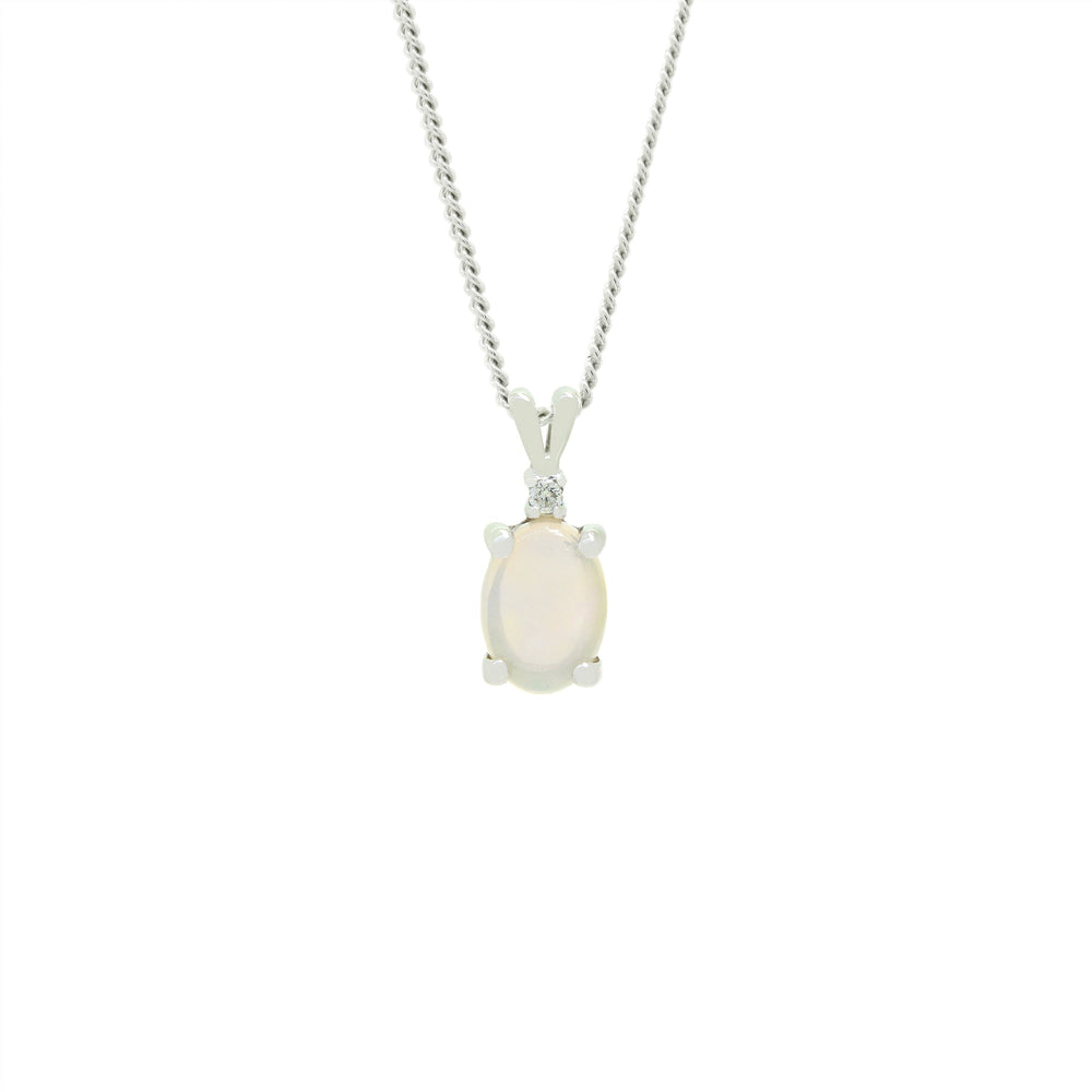 A product photo of a white opal pendant set in solid 9ct gold suspended by a golden chain over a white background. The white, fiery opal stone shimmers with orange and green fire, and is topped a single white diamond.