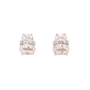 
            
                Load image into Gallery viewer, A product photo of a pair of 9 karat white gold morganite earrings sitting against a white background. One smaller pink gemstone oval is stacked upon a larger oval on each earring, with the area where the two stones make contact decorated by a single small diamond on either side.
            
        