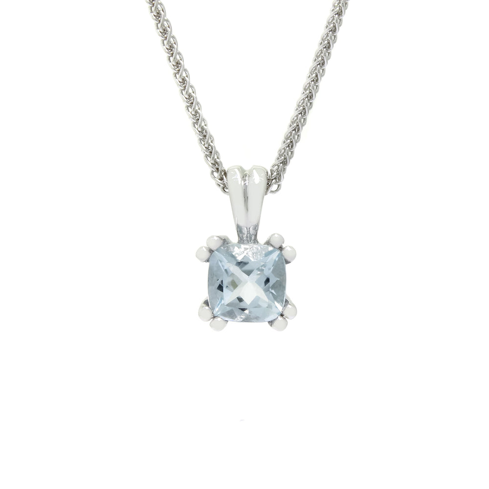 
            
                Load image into Gallery viewer, A product photo of a white gold aquamarine pendant suspended by a chain against a white background. The squared cushion-cut stone is held in place by 2 small claws on each corner to a total of 8, and reflects pale baby blue colours from its many edges.
            
        
