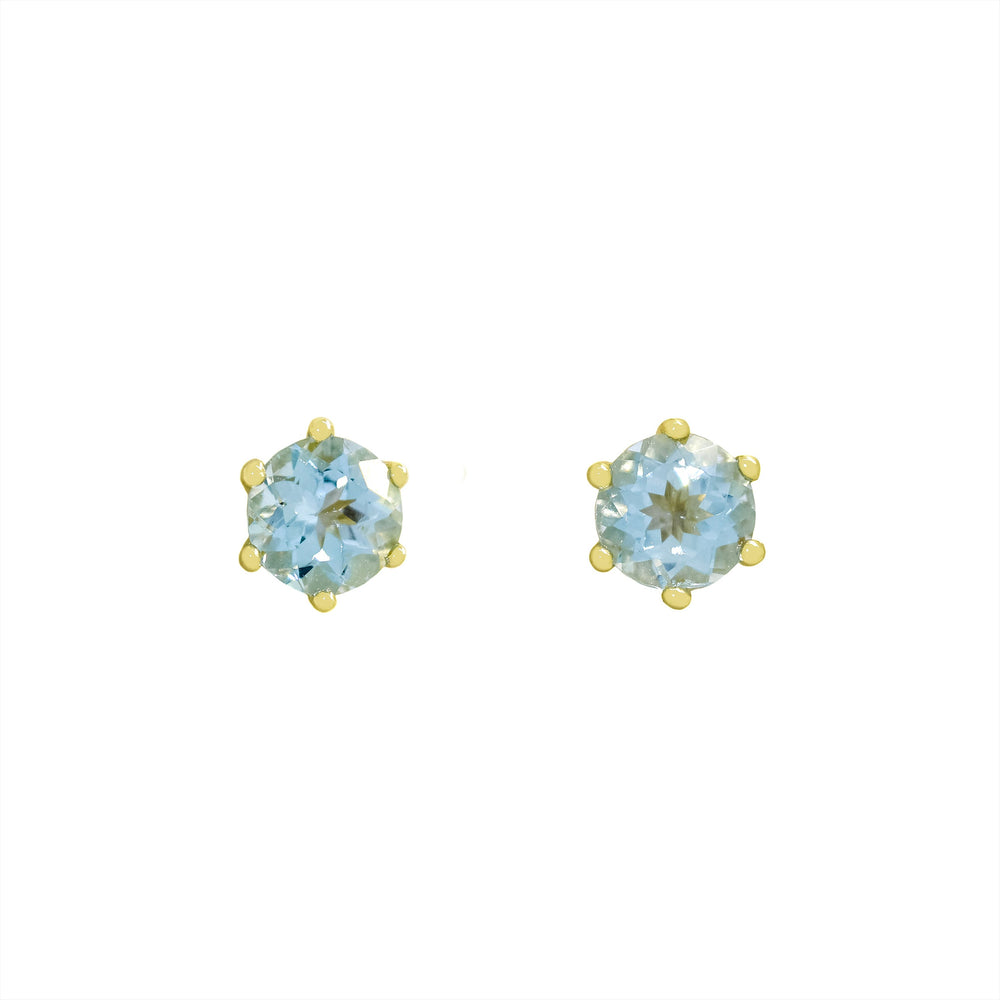 
            
                Load image into Gallery viewer, A product photo of two yellow gold stud earrings sitting on a white background. Held in place by 6 golden claws each are two dazzling round-cut aquamarine gemstones, reflecting shades of baby blue light from their many edges.
            
        