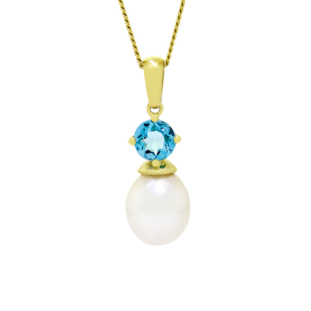 This product image is a close-up of a beautiful solid 9 karat yellow gold pearl and gemstone pendant design suspended by a gold chain. The pendant primarily features a round-cut bright blue topaz stone in the centre, set with delicate gold claws above a single white drop-shaped pearl. A thin gold chain connects to the pendant.