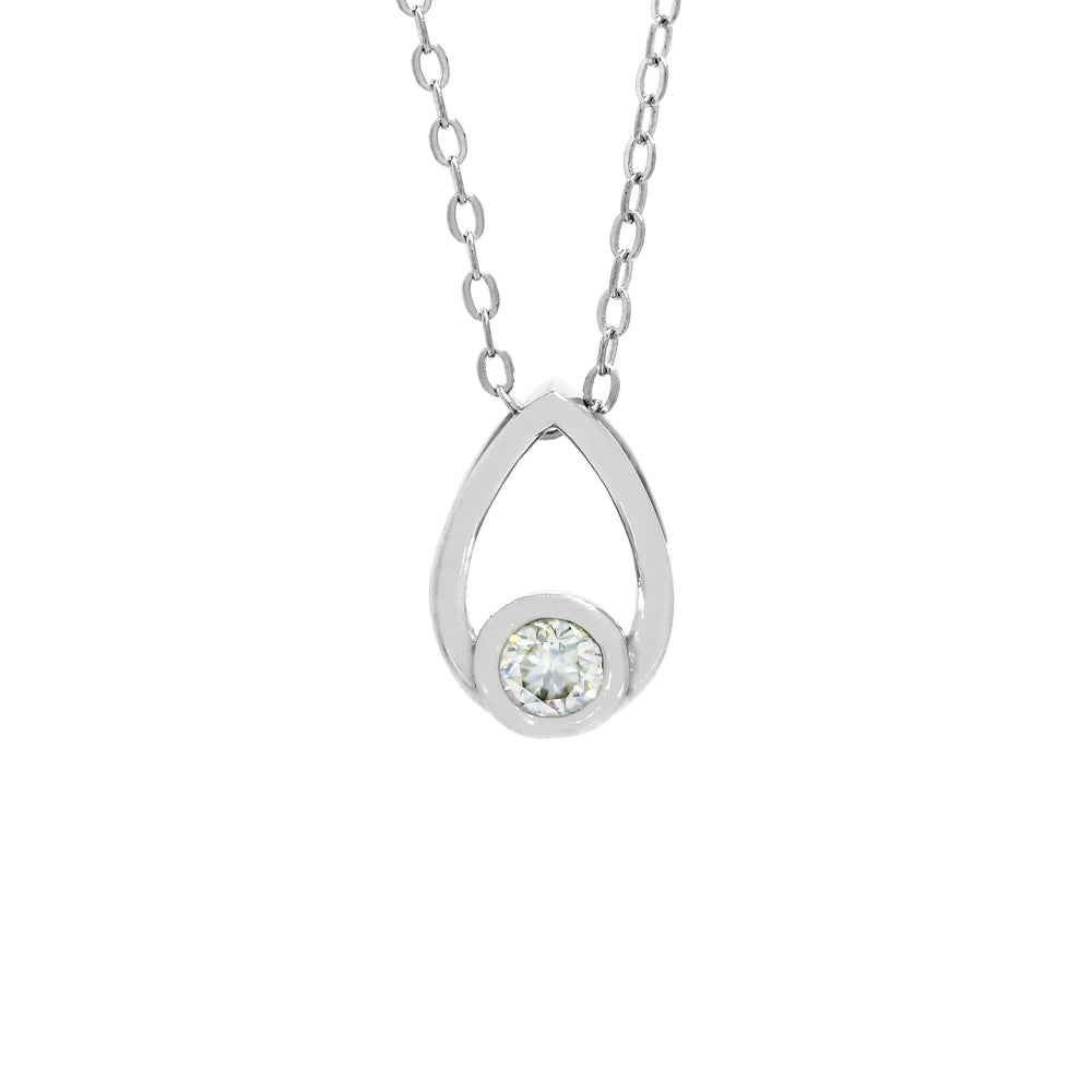 A product photo of a moissanite pendant in solid 925 sterling silver suspended by a silver chain on a clear white background. The pendant is in the shape of a small teardrop, with a petite silver-encased circle-cut moissanite gem nestled at its base. The silver teardrop shape is smooth and unblemished.