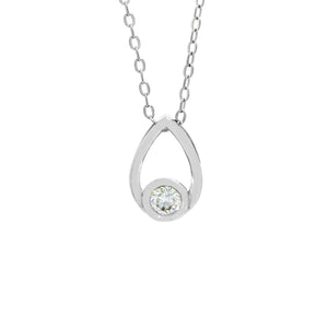 A product photo of a moissanite pendant in solid 925 sterling silver suspended by a silver chain on a clear white background. The pendant is in the shape of a small teardrop, with a petite silver-encased circle-cut moissanite gem nestled at its base. The silver teardrop shape is smooth and unblemished.