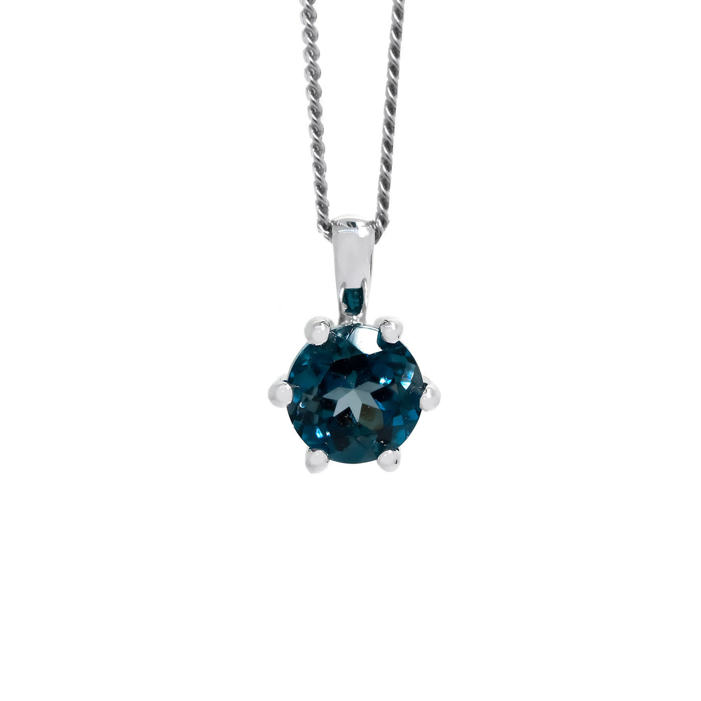 
            
                Load image into Gallery viewer, A product photo of a 6mm Round London Blue Topaz Pendant in 9k White Gold suspended by a gold chain against a white background. The stone is held in place by 6 delicate golden claws. The topaz reflects ocean blue hues across its multi-faceted edges.
            
        