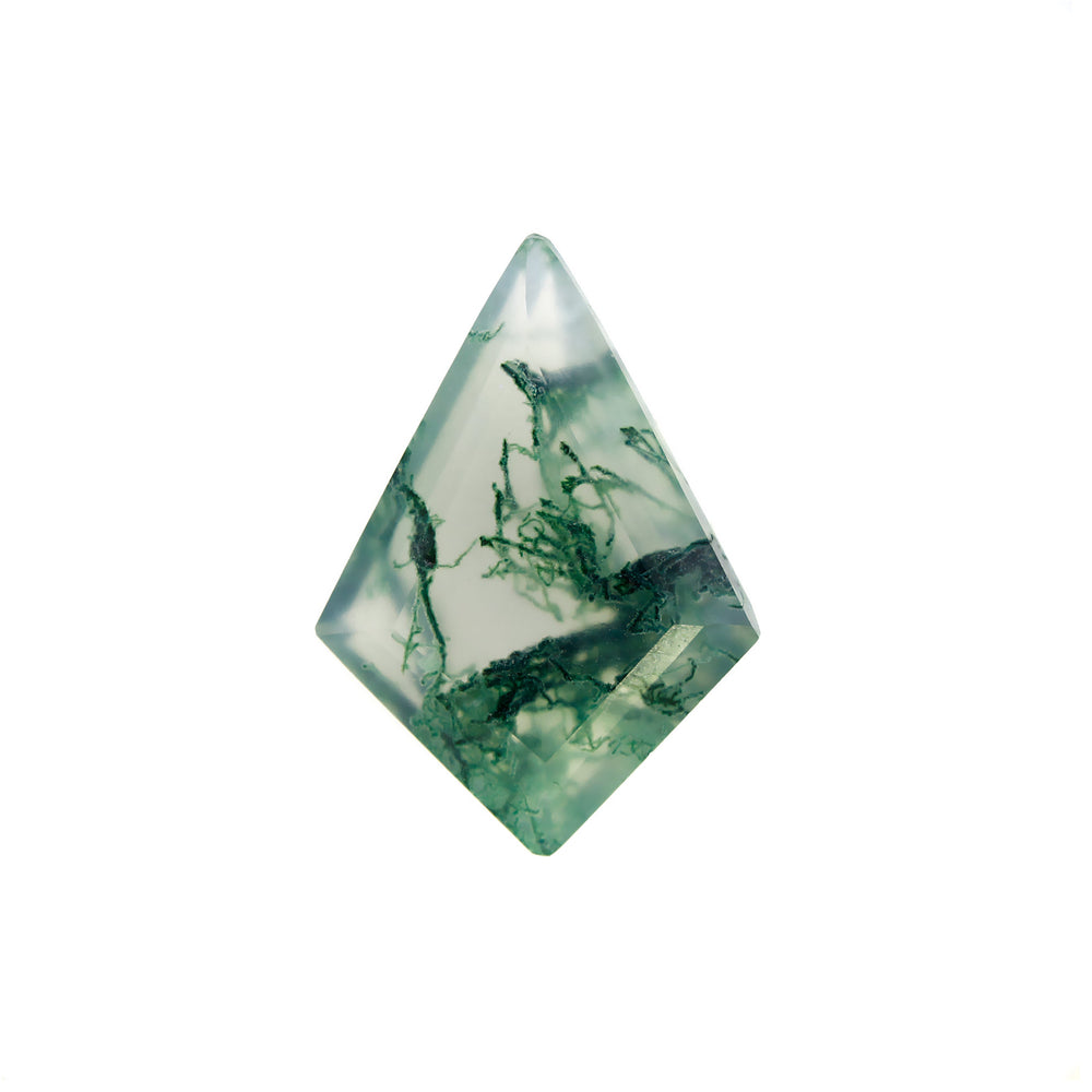 A product image of a loose 14x10mm faceted moss agate stone in the classic kite-shaped gemstone cut. The stone has a cool white milky colour, with deep, swirling green natural inclusions - appearing as moss-like structures or delicate inkspills within the stone. The faceted edges reflect bright white light.