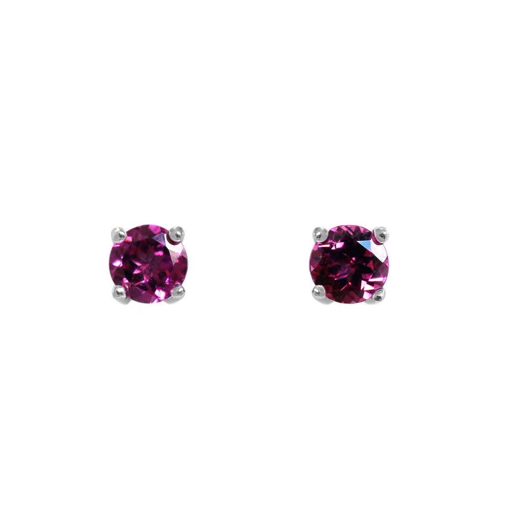 A product photo of two 925 silver rhodalite stud earrings sitting on a white background. Held in place by 4 silver claws each are two dazzling 5mm round-cut purple rhodalite garnet stones.