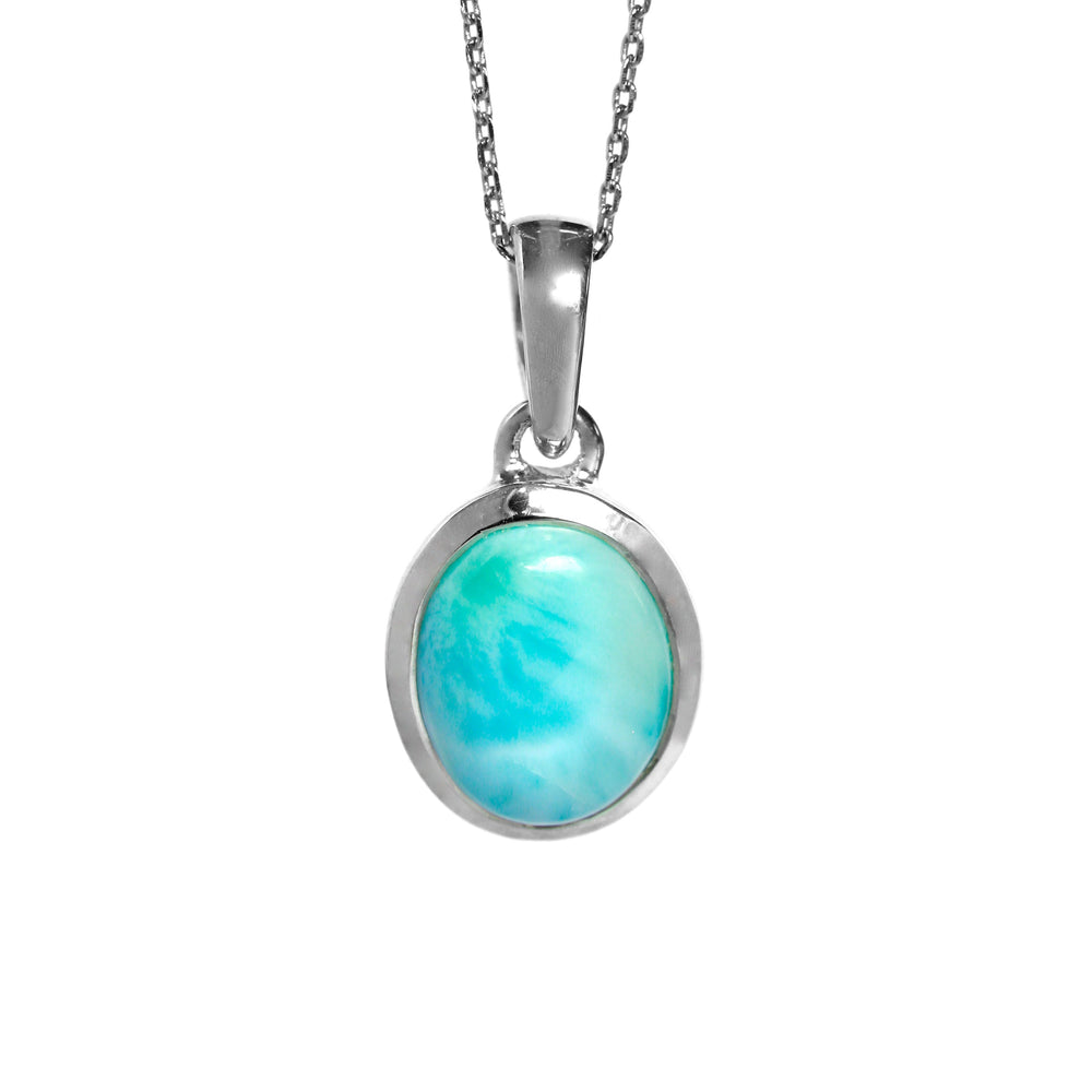 A product photo of a silver Larimar necklace suspended over a white background. The pendant features a 12x10mm oval-shaped cabochon Larimar stone in a silver bezel setting. The gemstone has dappled white and light blue patterning, similar to water reflections at the bottom of a pool
