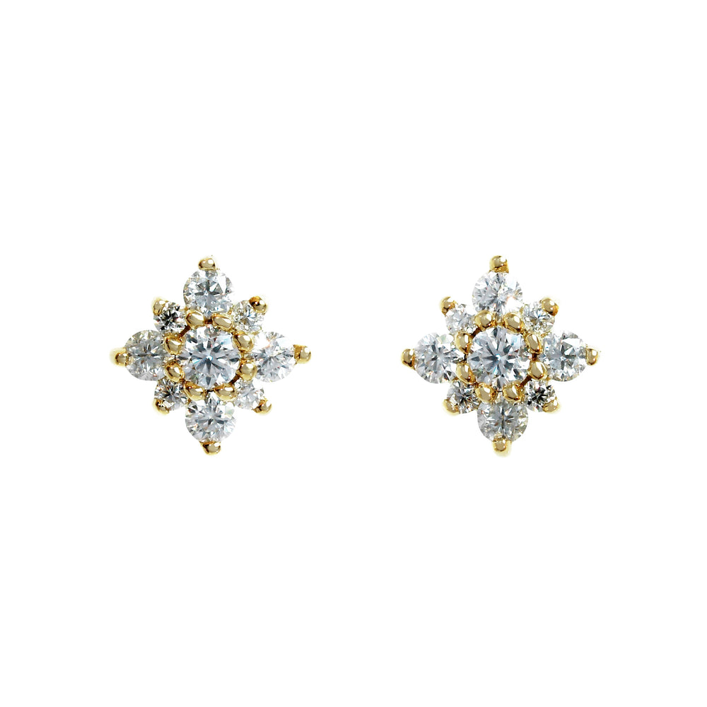 A product photo of a pair of moissanite stud earrings in 9k yellow gold sitting on a white background. Each earring consists of 8 little moissanite stones arranged around a single moissanite centre-stone in a starburst-like pattern.