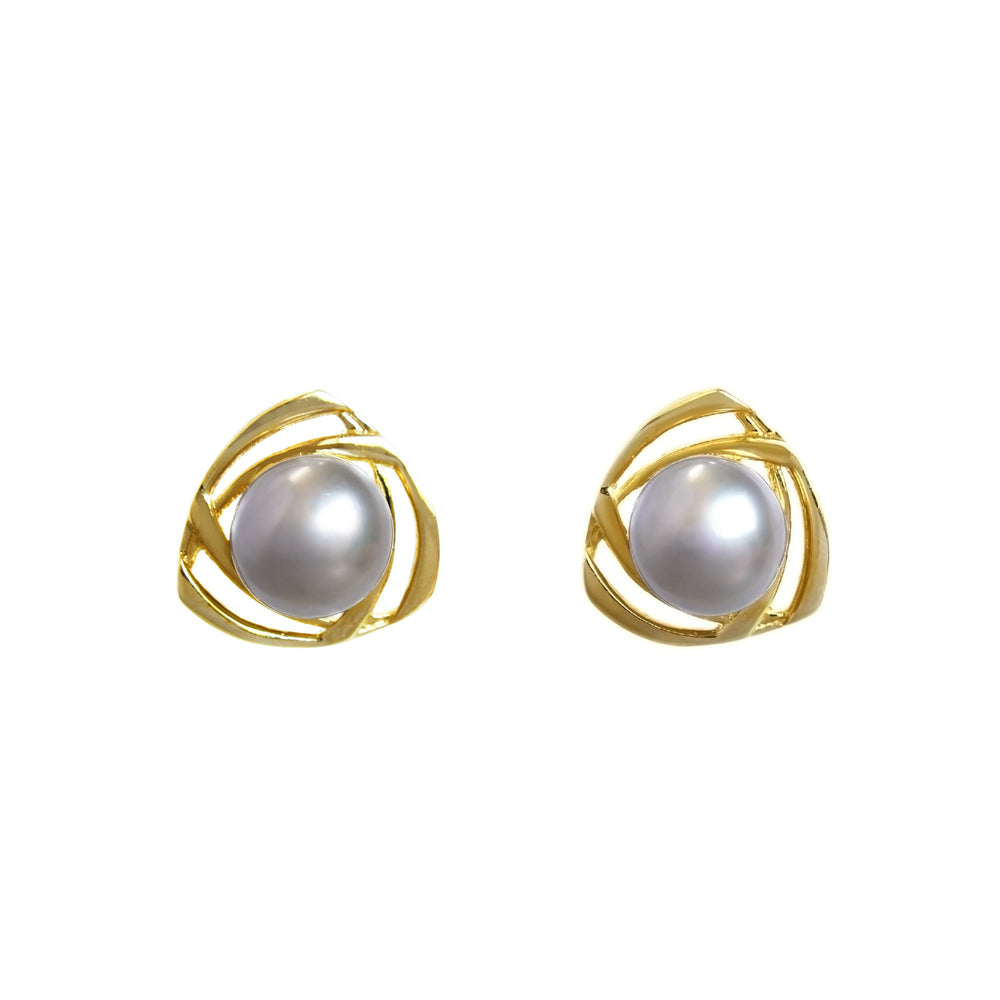 A product photo of a pair of 8mm steel grey pearl earring studs with ornate, twisted 9 karat yellow gold backs on a white background.