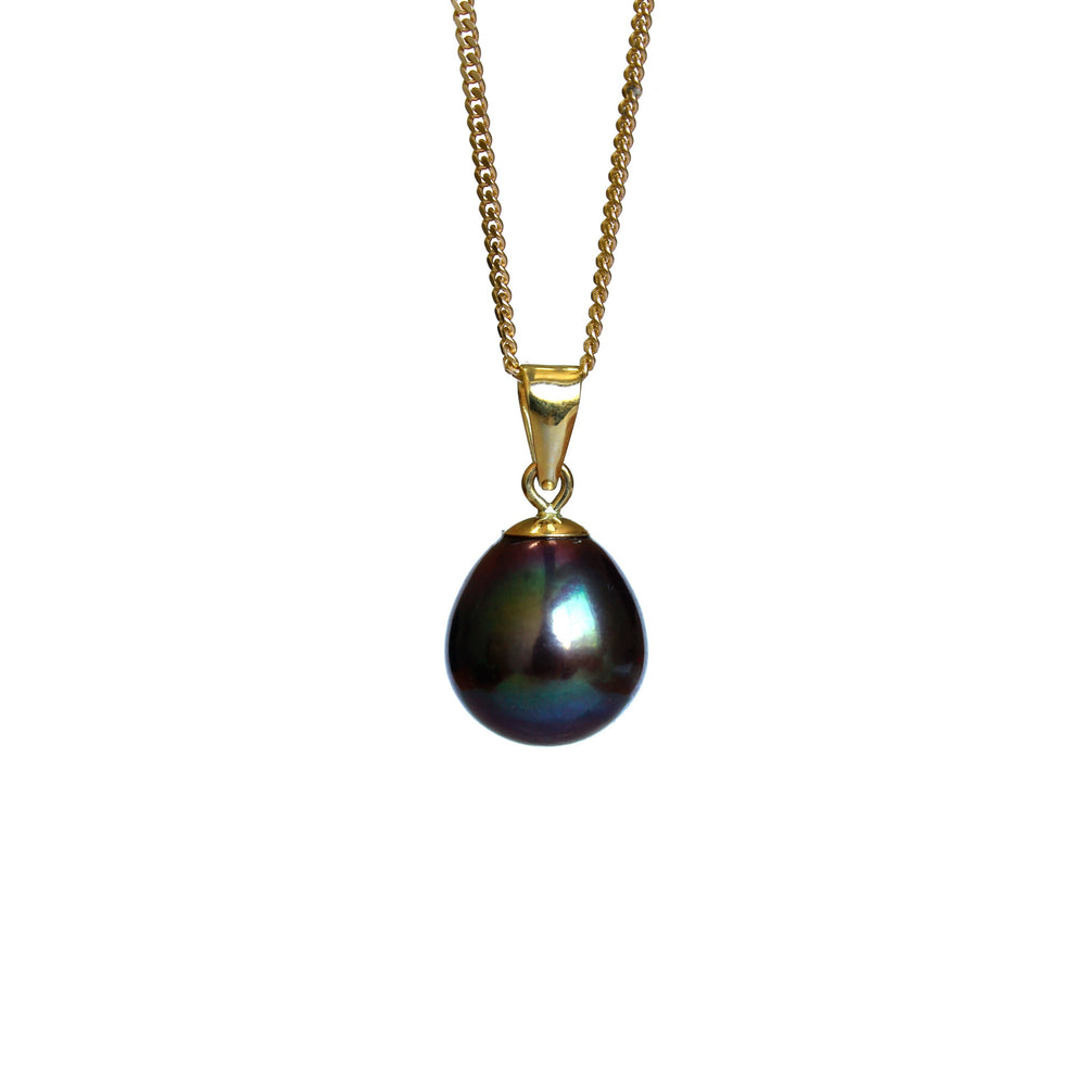 A product photo of a pearl pendant hanging by a yellow gold chain over a white background. The featured stone is a 11x9mm Peacock Pearl with a soft purple sheen.