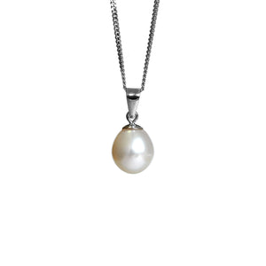 A product photo of a pearl pendant hanging by a white gold chain over a white background. The featured stone is a 9.5x8mm White Pearl with a soft cream sheen.