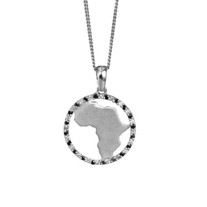 A product photo of a white gold diamond-embedded Africa pendant suspended against a white background by a golden chain. The design consists of a gold symbol of the African continent held in place by a circular diamond-embedded frame of white gold.