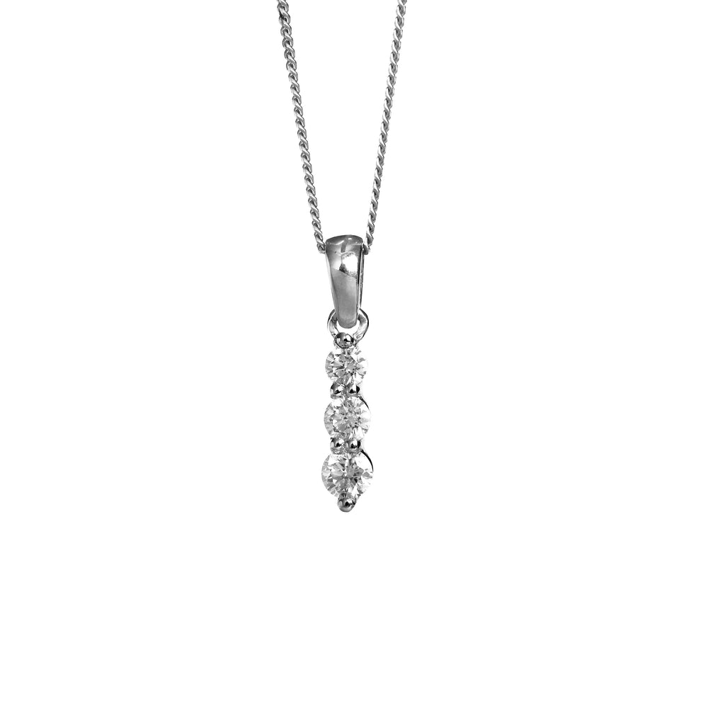 A product photo of a white gold diamond pendant made up of 3 stones stacked vertically, descending from smallest to largest. The pendant is suspended by a golden chain against a white background.